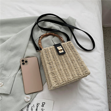 white braided ladies one shoulder crossbody holiday beach bag with zipper buckle closure
