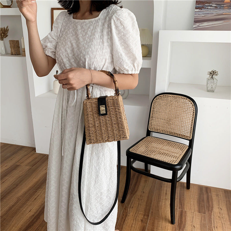 White braided ladies one shoulder crossbody bag with zipper buckle for holiday beach use